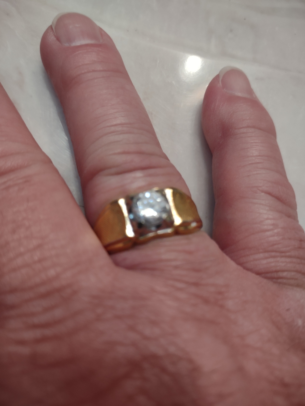 Gold Tone Ring with Clear Center Stone